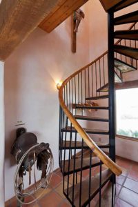 Taos vacation rental home winding staircase